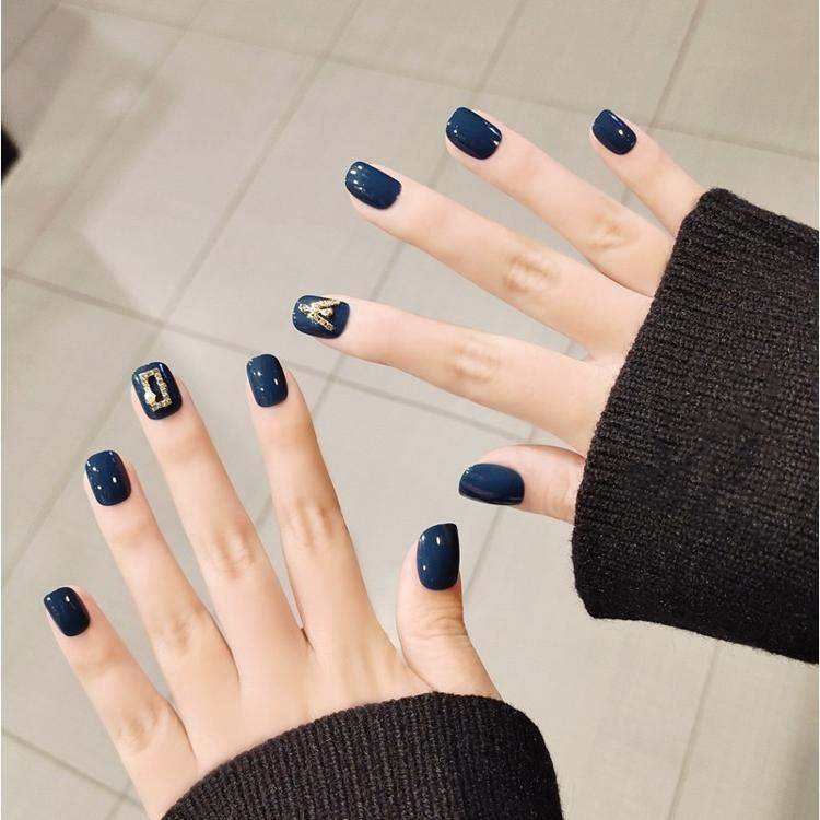 Elegant Deep Blue Nails with Gold