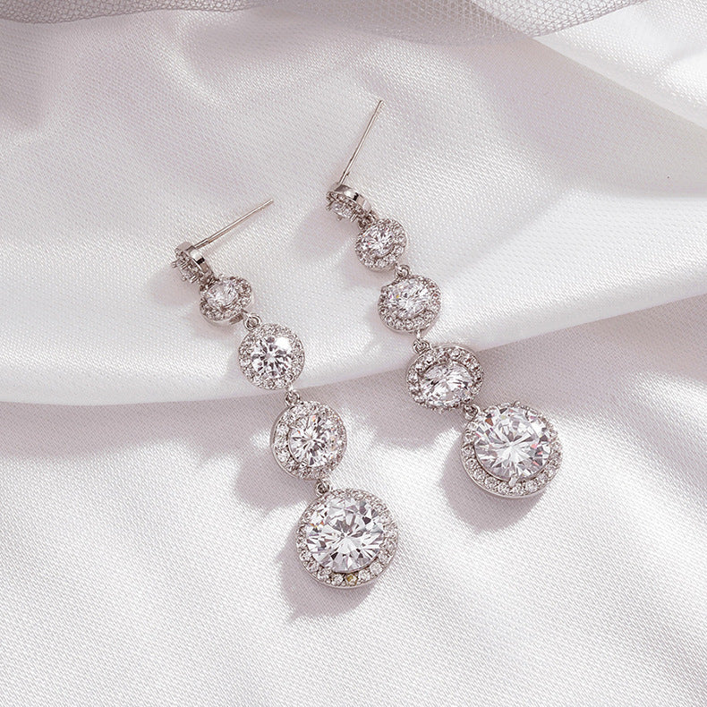 Round zircon long earrings