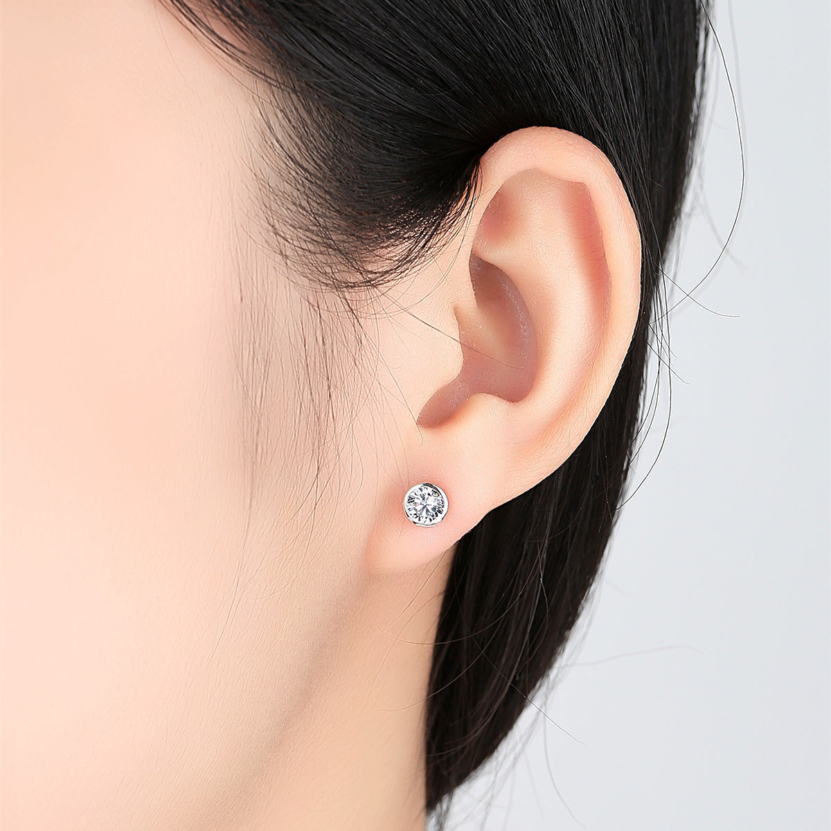 Simulated zircon solitaire bezel earrings