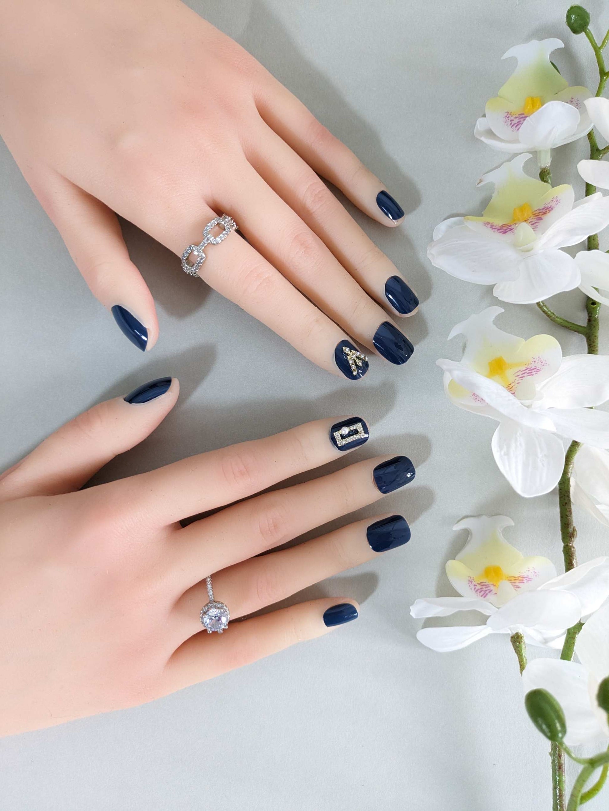 Elegant Deep Blue Nails with Gold